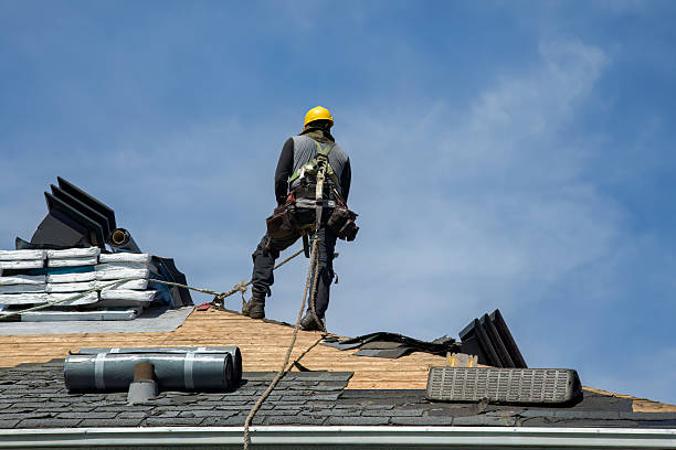 Professional Roofing technician working in Riceville, IA
